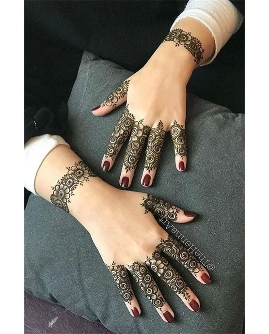Refined Ruffle And Anklet Covering Back Finger Mehndi Design